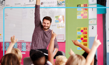 Teacher asks students to raise hands
